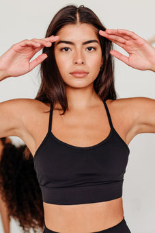 Black Overtime sports bra, front view